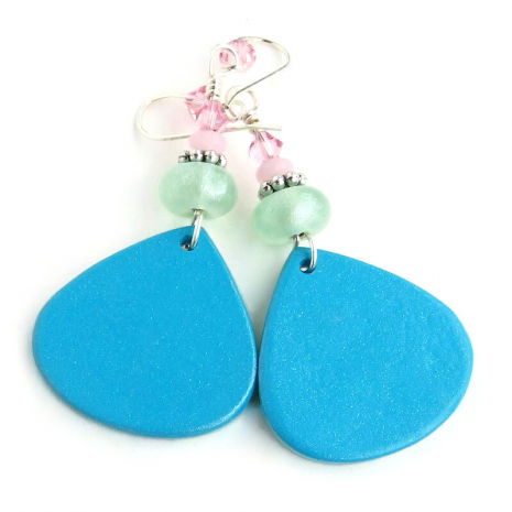 aqua blue back side of polymer clay magnolia earrings handmade