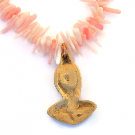 back side of bronze goddess rising pendant