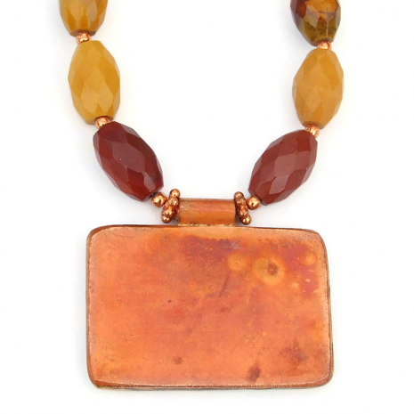 back side of copper bone pendant