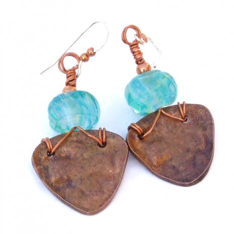 back side of copper phoenix thunderbird earrings