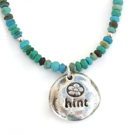 back side of fine silver hamsa hand pendant necklace handmade