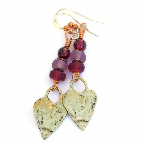 back side of gold bronze paw print heart earrings handmade jewelry