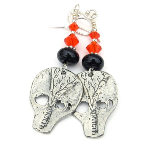 back side of goth skull halloween earrings with ivy and makers mark handmade