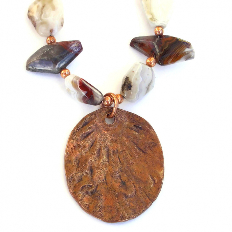 back side of handmade copper feather pendant necklace