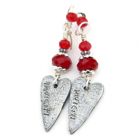 back side of heart earrings showing the makers mark