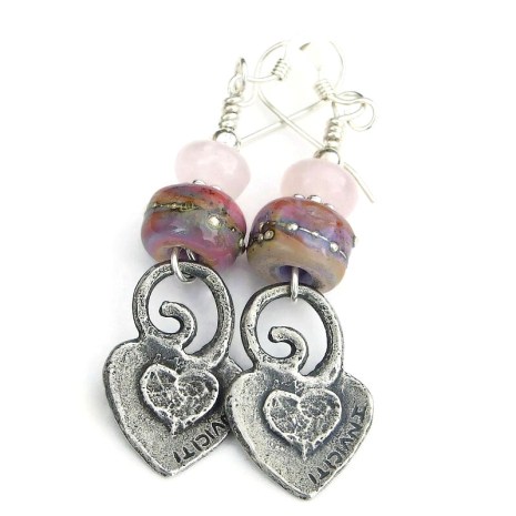 back side of hearts flowers spirals earrings with makers mark heart