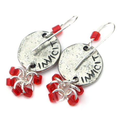 back side of pewter flower earrings showing makers mark