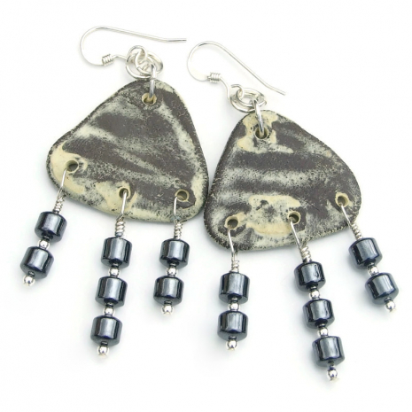 back side of rustic petroglyph deer elk ceramic earrings handmade