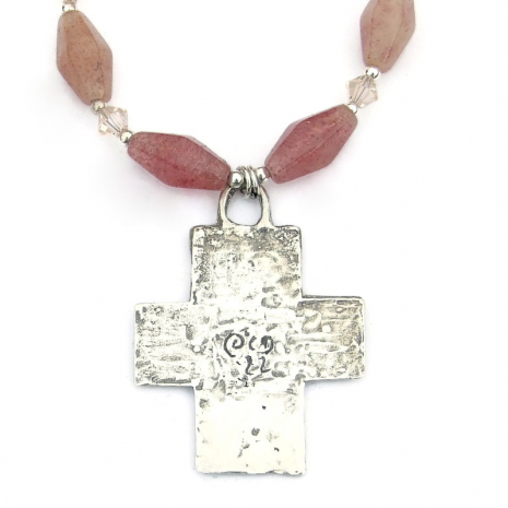 back side of sterling silver cross with the artists makers mark