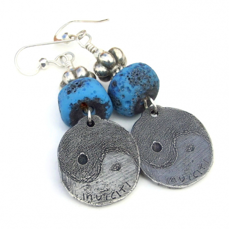 back side of yin yang handmade earrings showing makers mark