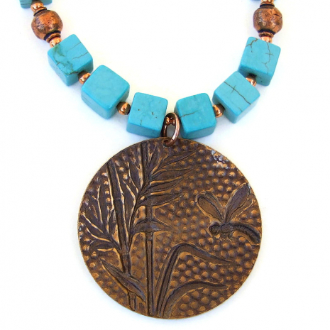 backside of brass dragonfly pendant