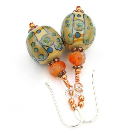 beige green blue tribal symbols lampwork glass jewelry handmade carnelian