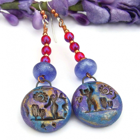 blue purple and gold hieroglyph earrings