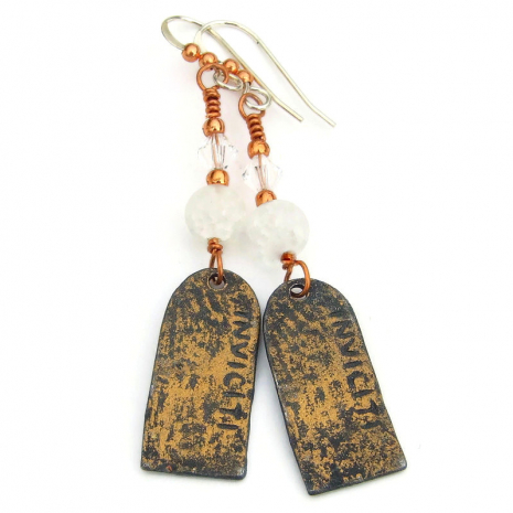 bronze back side of moon goddess earrings with the artists makers mark