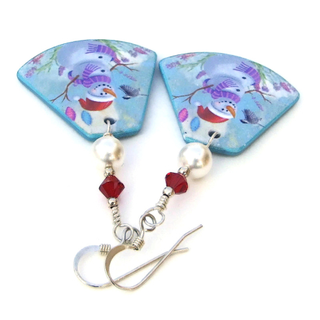 The Snowman Meets Chickadee handmade earrings shown from the top. christmas jewelry snowman chickadees