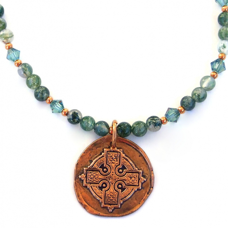 close up of copper celtic cross artisan pendant
