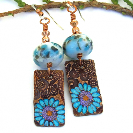 The Flores Bonitas handmade earrings features artisan hand painted copper flower dangles and artisan made lampwork glass beads - unique jewelry for women. flower dangle earrings with copper and lampwork