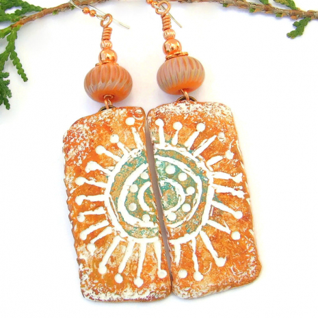 hand painted petroglyph sun symbol earrings handmade jewelry