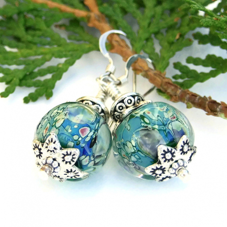 The artist encased the aqua glass in clear glass to create an organic nugget shape - lovely for the woman who loves unique jewelry. Unique aqua lampwork glass earrings
