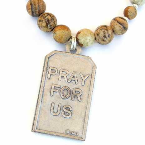 pray for us back side of handmade st francis pendant necklace