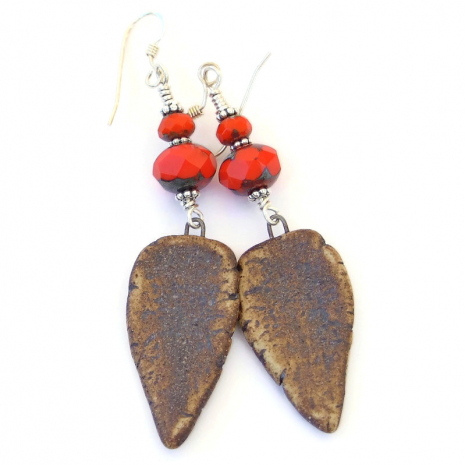 rustic back side of handmade ceramic shield dangles
