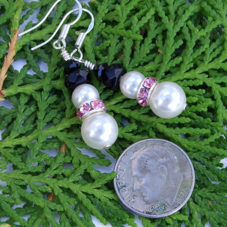 white, pink and black breast cancer survivor snowmen earrings.