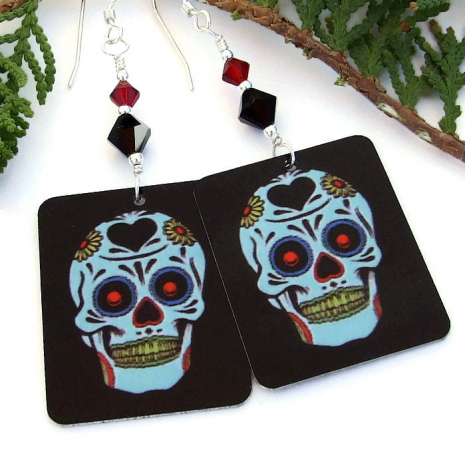 The colorful sugar skulls really pop against the black background - the crystals are perfect accents. Halloween and Day of the Dead handmade jewelry.