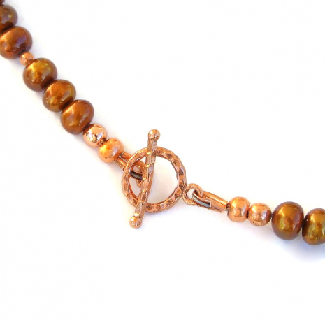 textured copper toggle clasp set finishes the handmade necklace