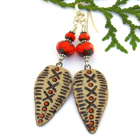 tribal shield earrings handmade ceramic dots x's orange czech glass