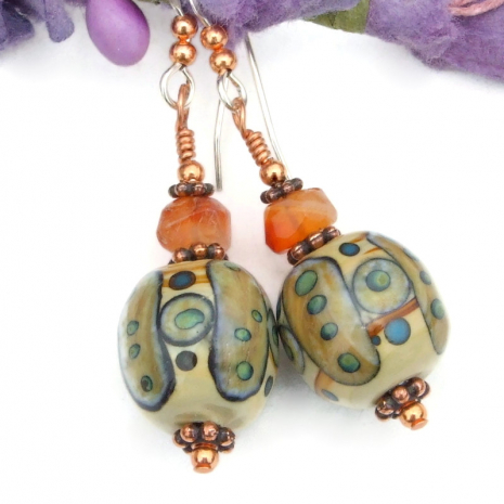 tribal symbols jewelry handmade lampwork faceted carnelian