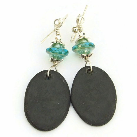 unglazed black back side of peace dove ceramic dangle earrings