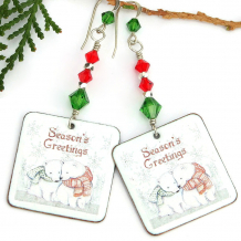 The whimsical SEASON'S GREETINGS handmade earrings feature artisan polar bear enamel dangles, red and green Swarovski crystals and sterling silver - unique Christmas holiday jewelry gift for women. christmas holidays polar bear earrings handmade red green swarovski crystals