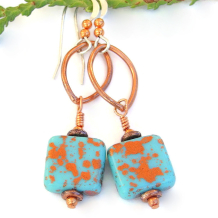 copper splash on turquoise glass handmade earrings ovals dangles