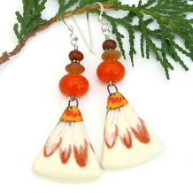 daisy jewelry with orange lampwork beads