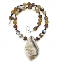 The EARTH SONG handmade necklace features a glittering druzy pendant, faceted brown fire agate and red garnet - unique gemstone jewelry for women. druzy agate pendant necklace brown fire agate red garnet