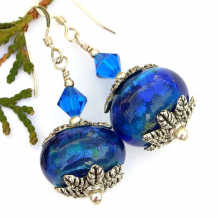 glowing blue lampwork glass earrings swarovski crystals