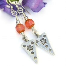 The unique FLORET handmade earrings feature Thai Hill Tribes fine silver flower charms, peachy pink Czech glass beads and sterling silver - unique floral jewelry for women. thai hill tribes stamped flowers earrings triangle czech glass handmade