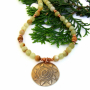 spiral_sun_bronze_pendant_and_striped_honey_onyx_gemstone_necklace.jpg